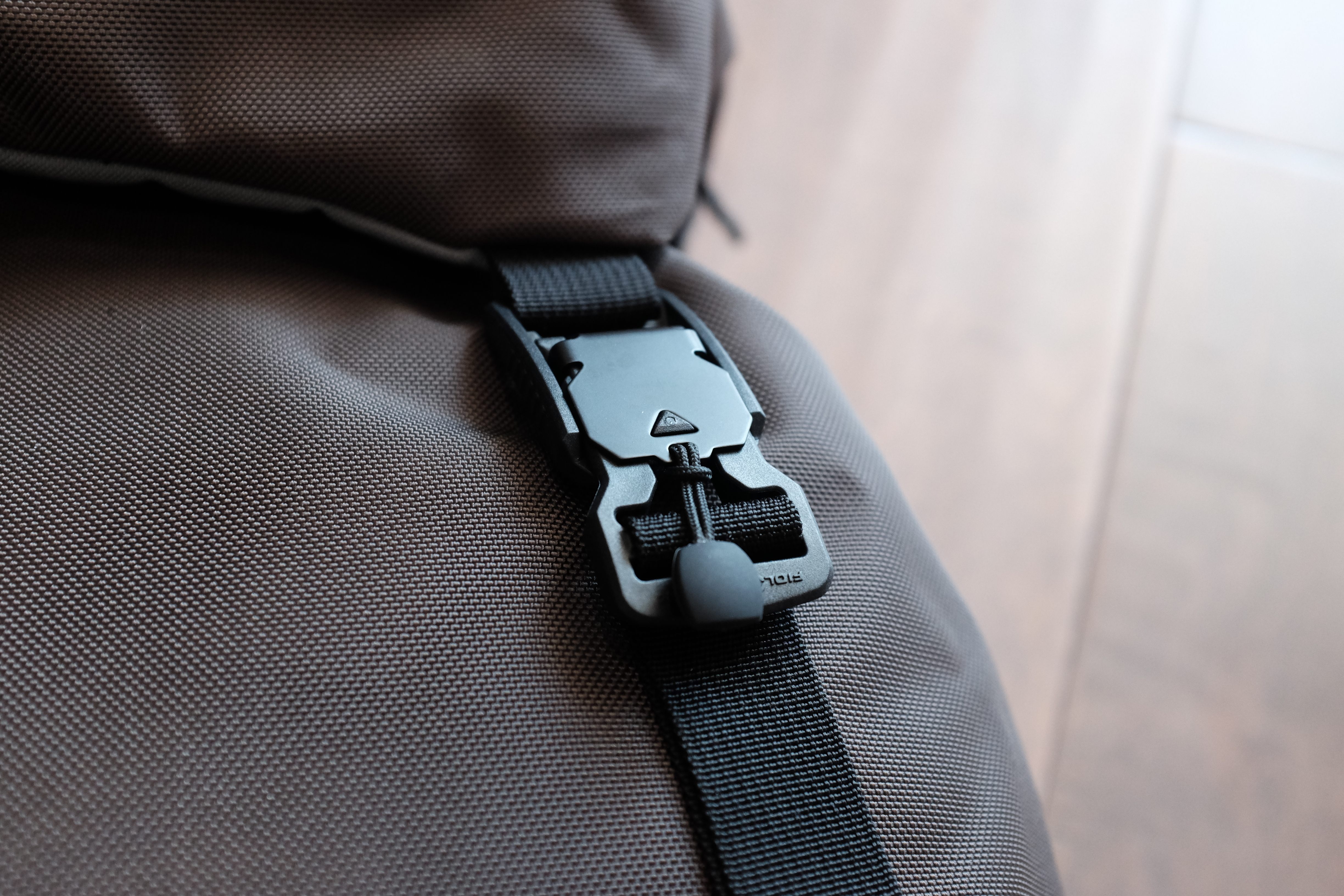 how to attach backpack strap to buckle, loop through clasp, strap